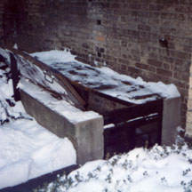 A strange pit lies sunken into the ground beside St. Michael's Cathedral.